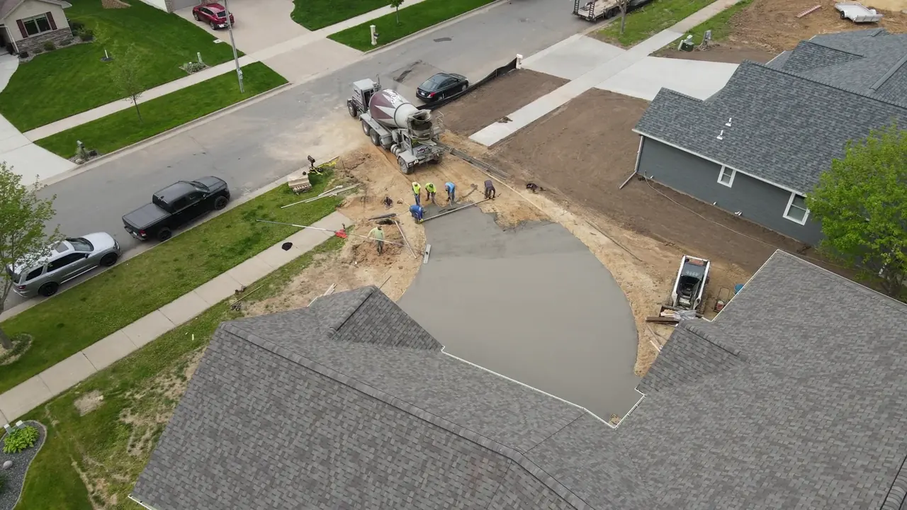 A new concrete driveway in Bexley with a broom finish and straight joints